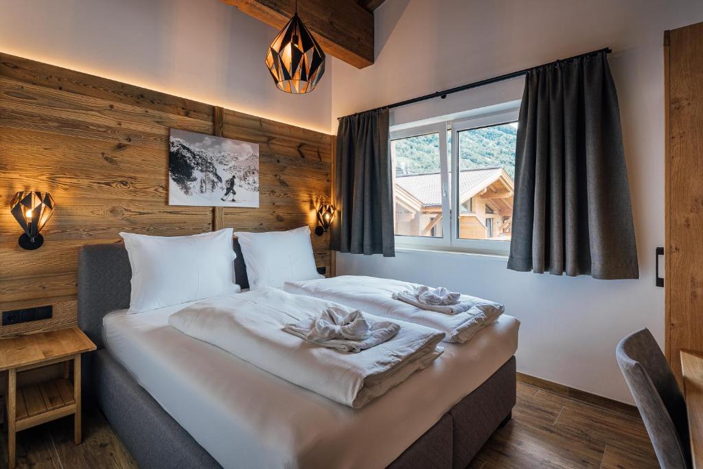 Stijlvol appartement van Der Kehlbachwirt met houten interieur en balkon